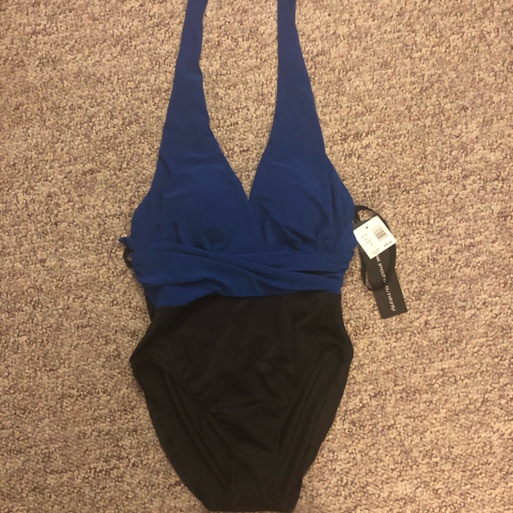 NWT size 10 one piece swimsuit. Slimming and sexy.